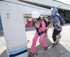 a skydiving student preparing to practicing from a mock up at skydive chicago