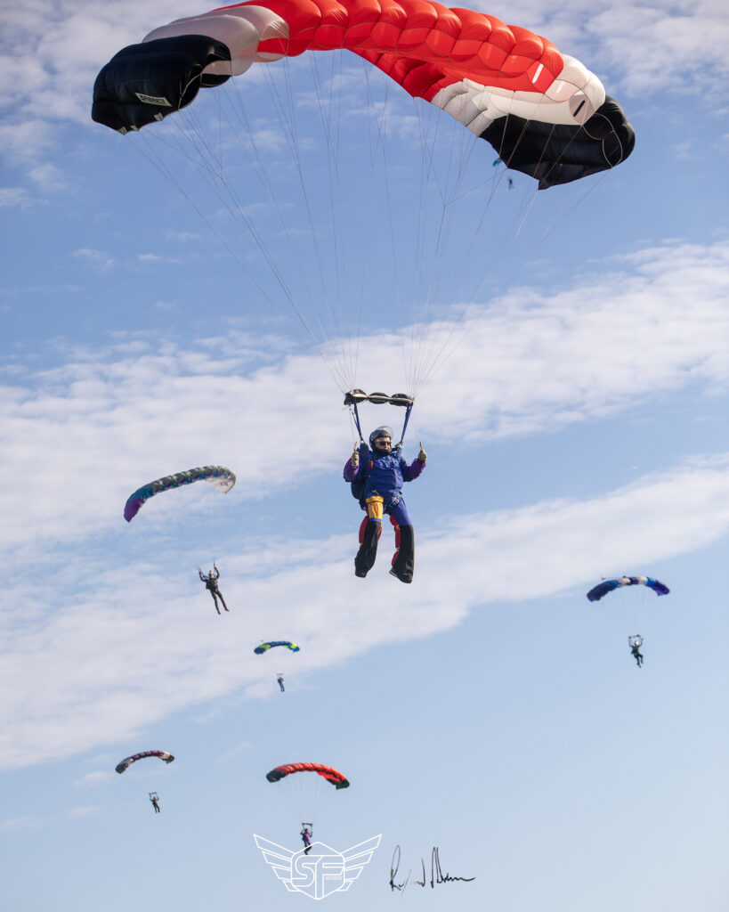 To earn your USPA B-license, you will need to take a canopy course. These are canopies landing at an event at Skydive Chicago.
