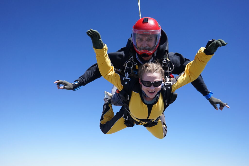 female tandem skydiving passenger at skydive chicago