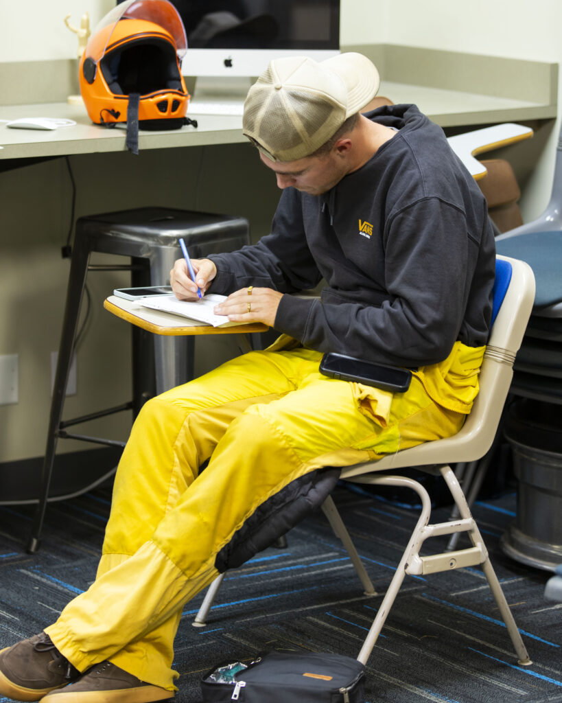 a solo skydiving student going through the ground school learning how to skydive at Skydive Chicago