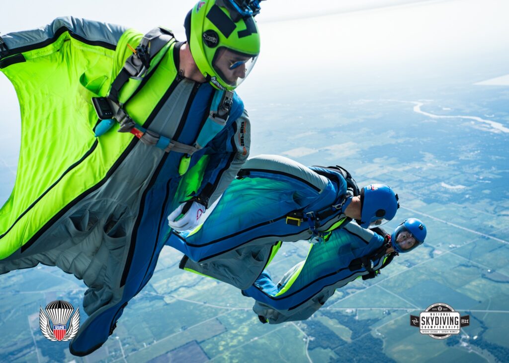 When you earn your C-license you can learn to fly a wingsuit. Wingsuit competitors exiting at Skydive Chicago.